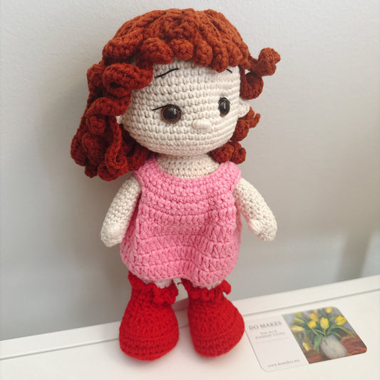Red hair doll in pink dress & hat