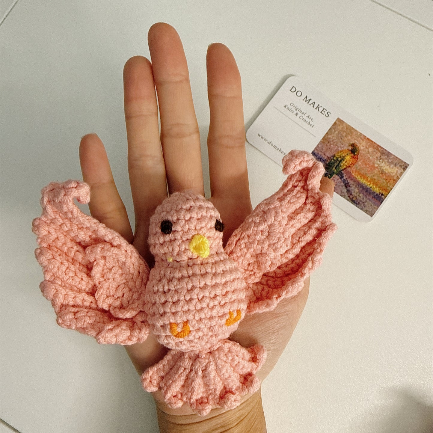 Pink Bird in Flight