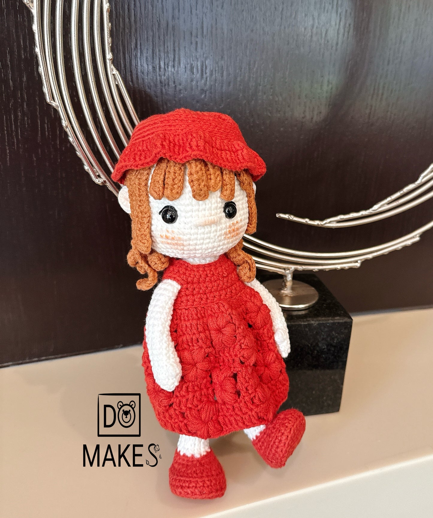 Brown hair doll in red dress & hat