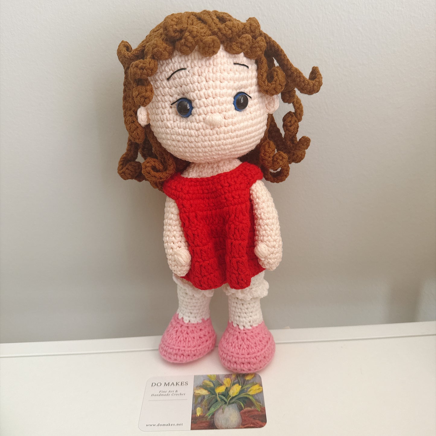 Brown hair doll in red dress