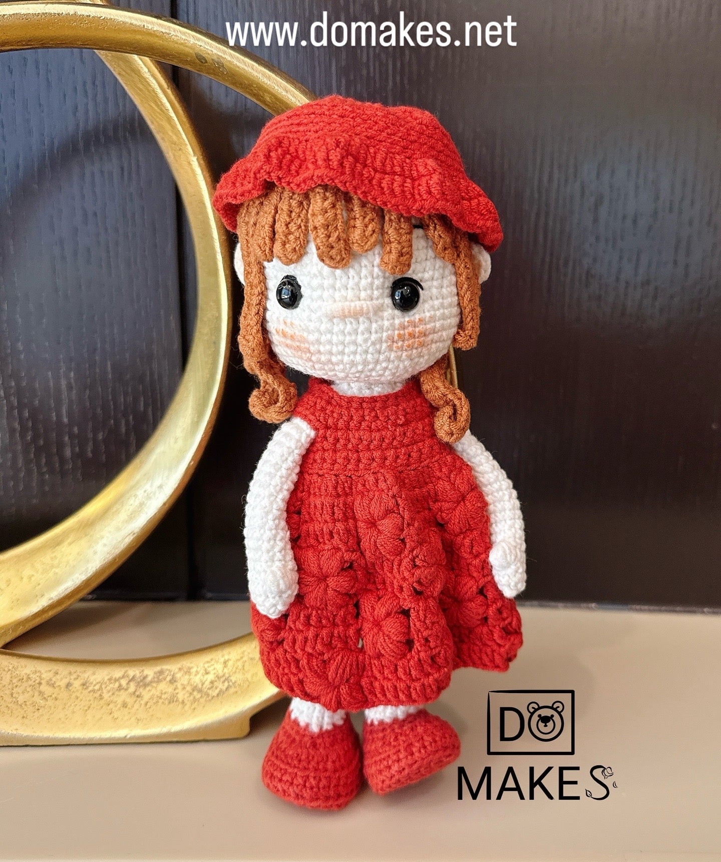 Brown hair doll in red dress & hat