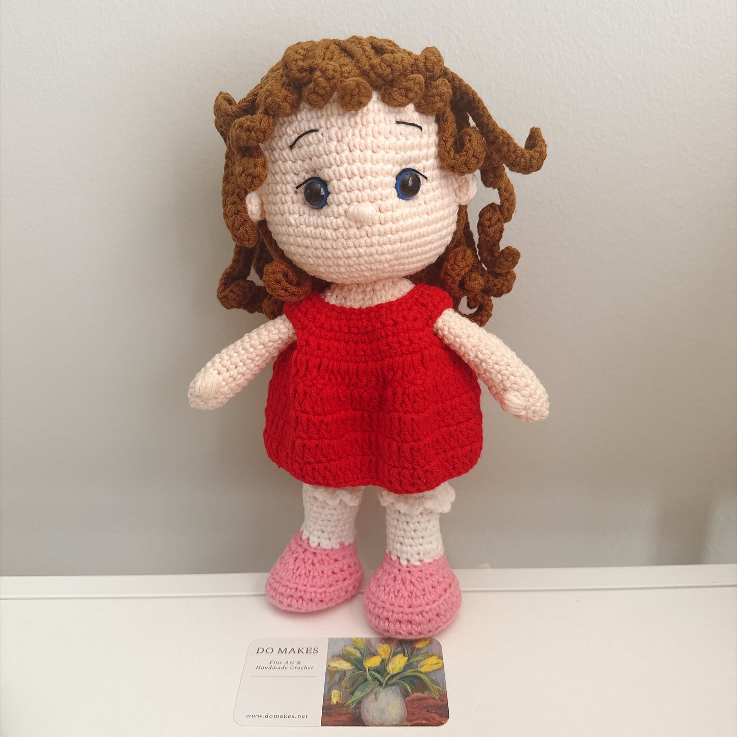 Brown hair doll in red dress