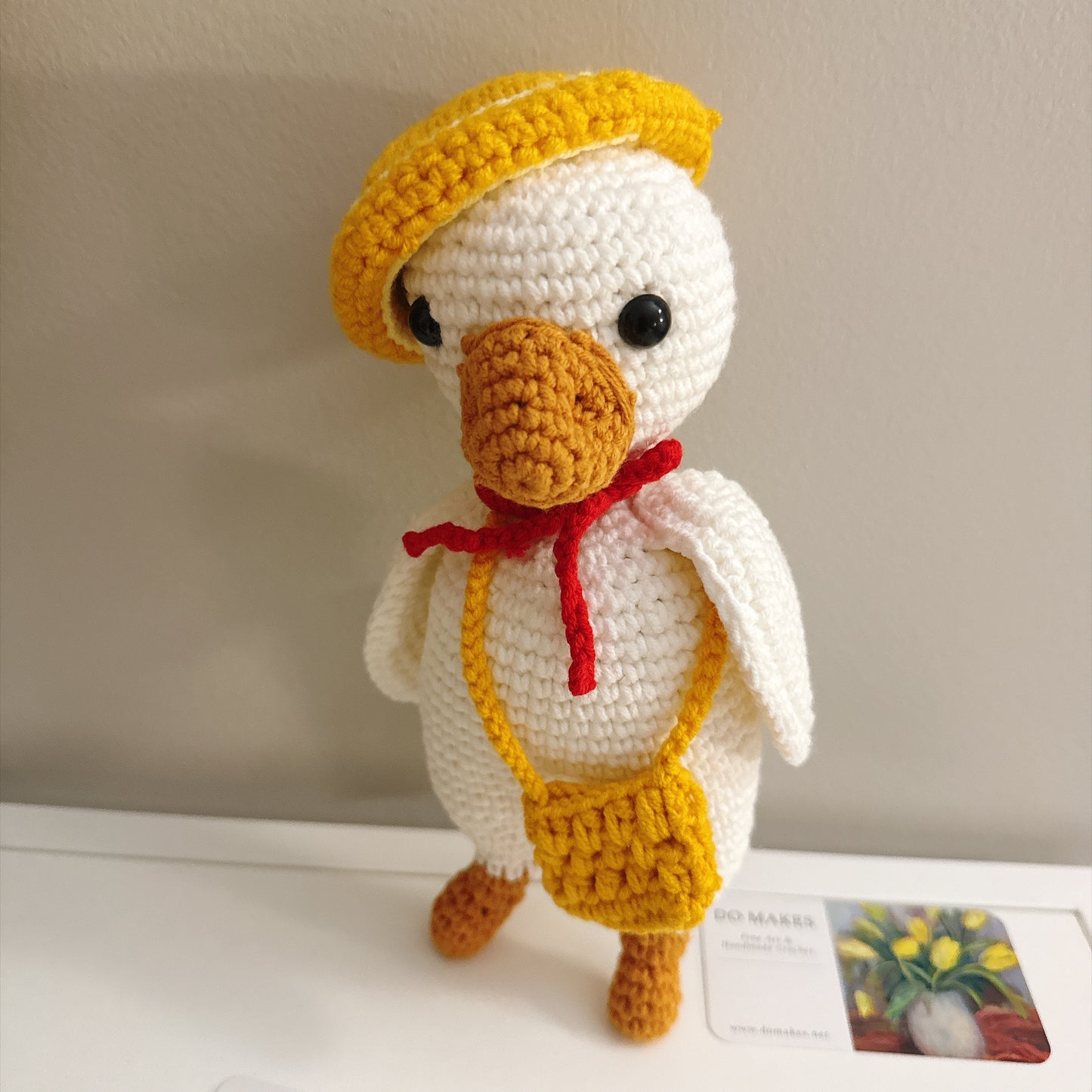 Crochet Goose with yellow hat