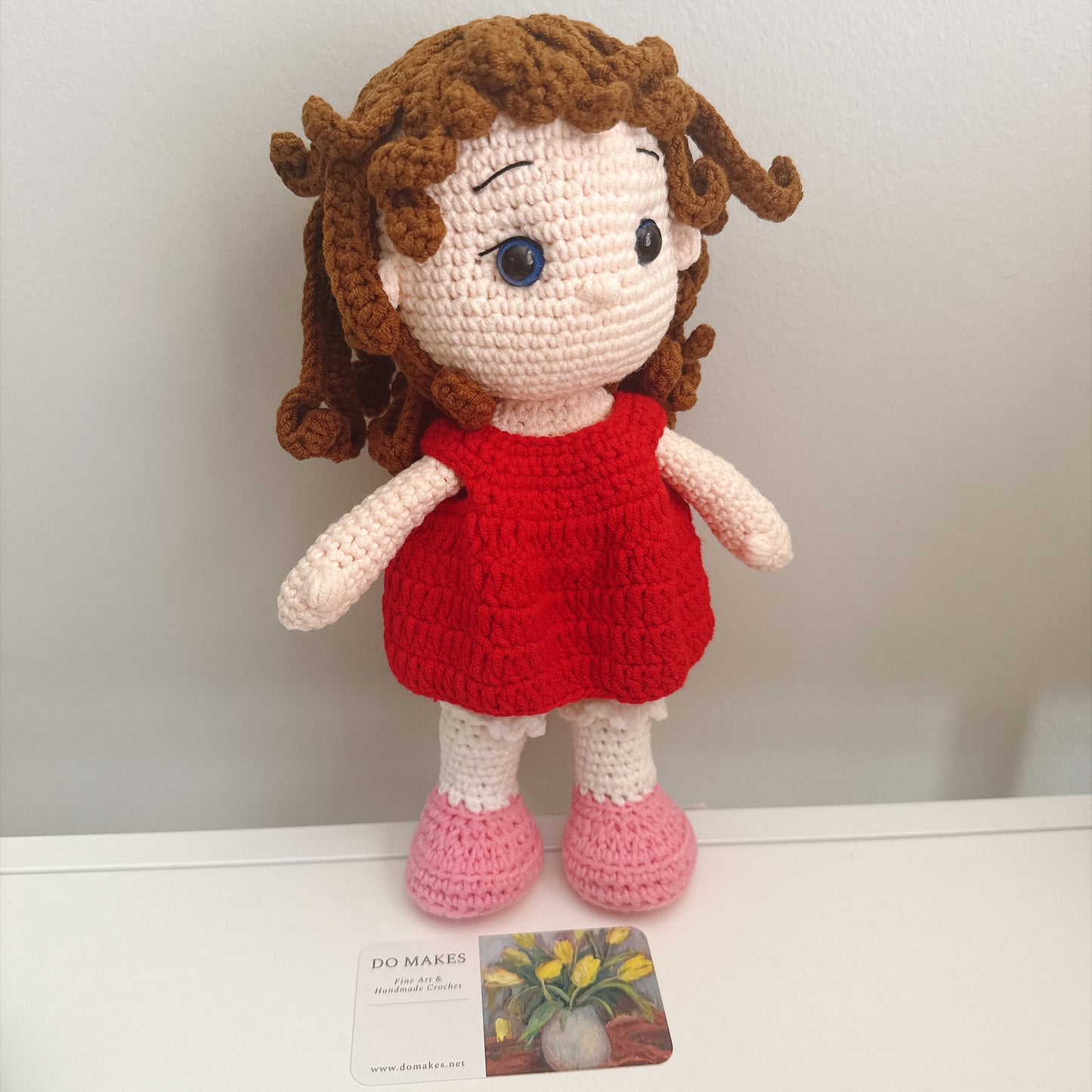 Brown hair doll in red dress