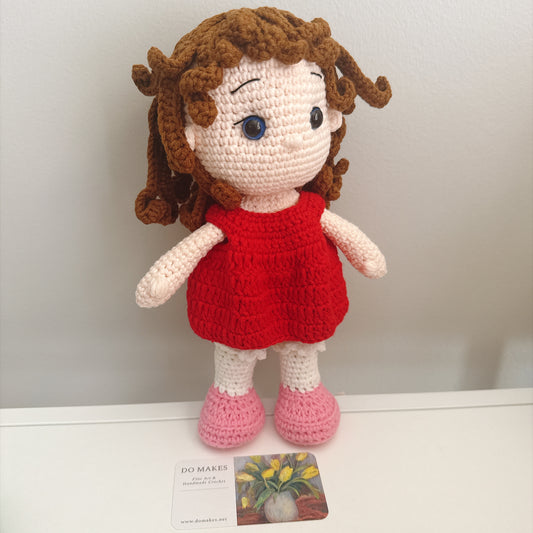 Brown hair doll in red dress