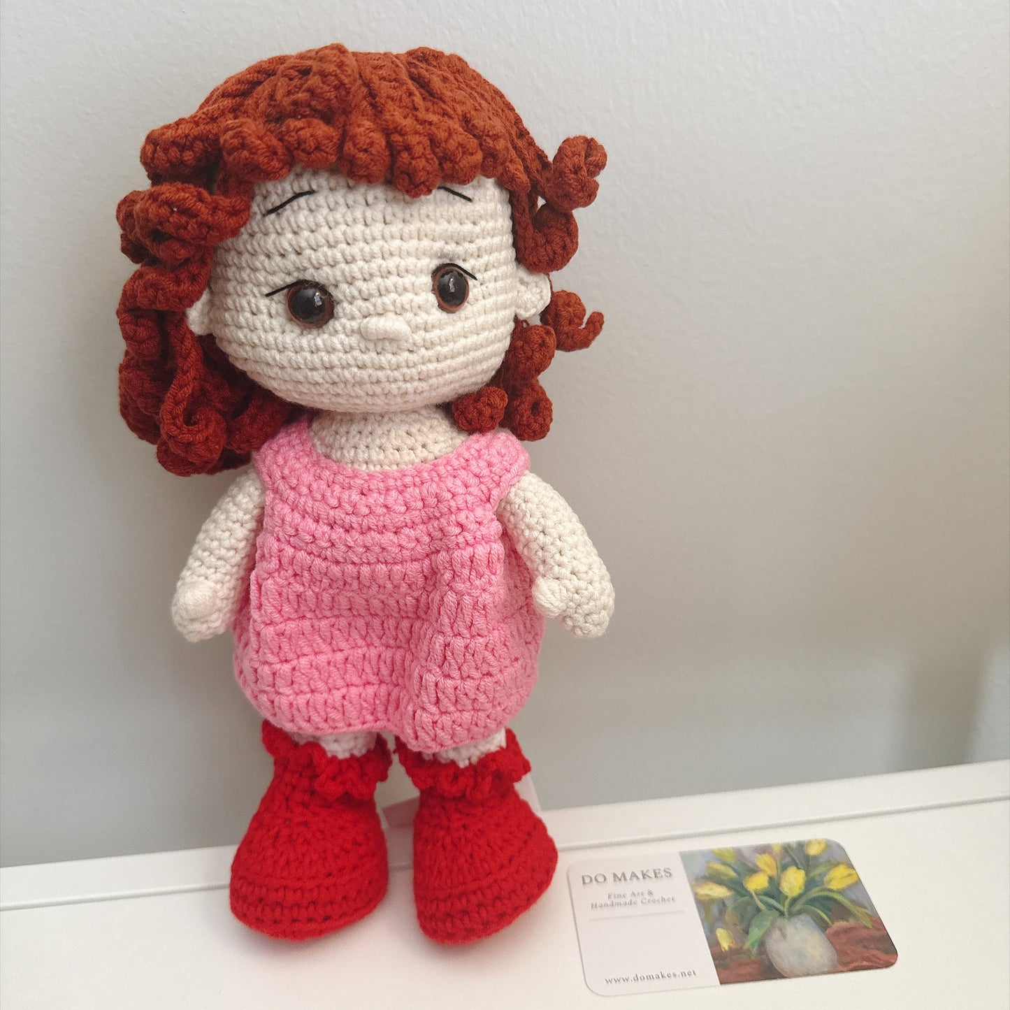 Red hair doll in pink dress & hat