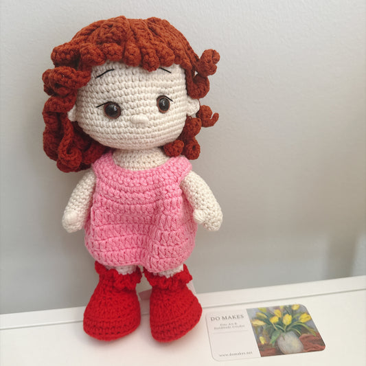 Red hair doll in pink dress & hat
