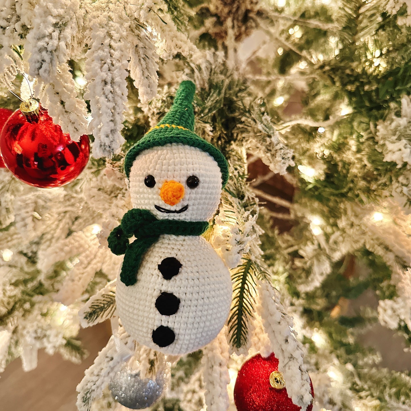 Snowman with green hat