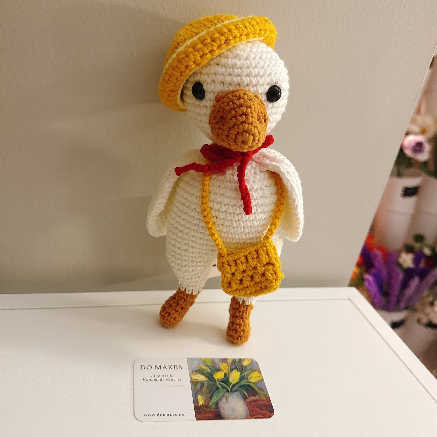Crochet Goose with yellow hat