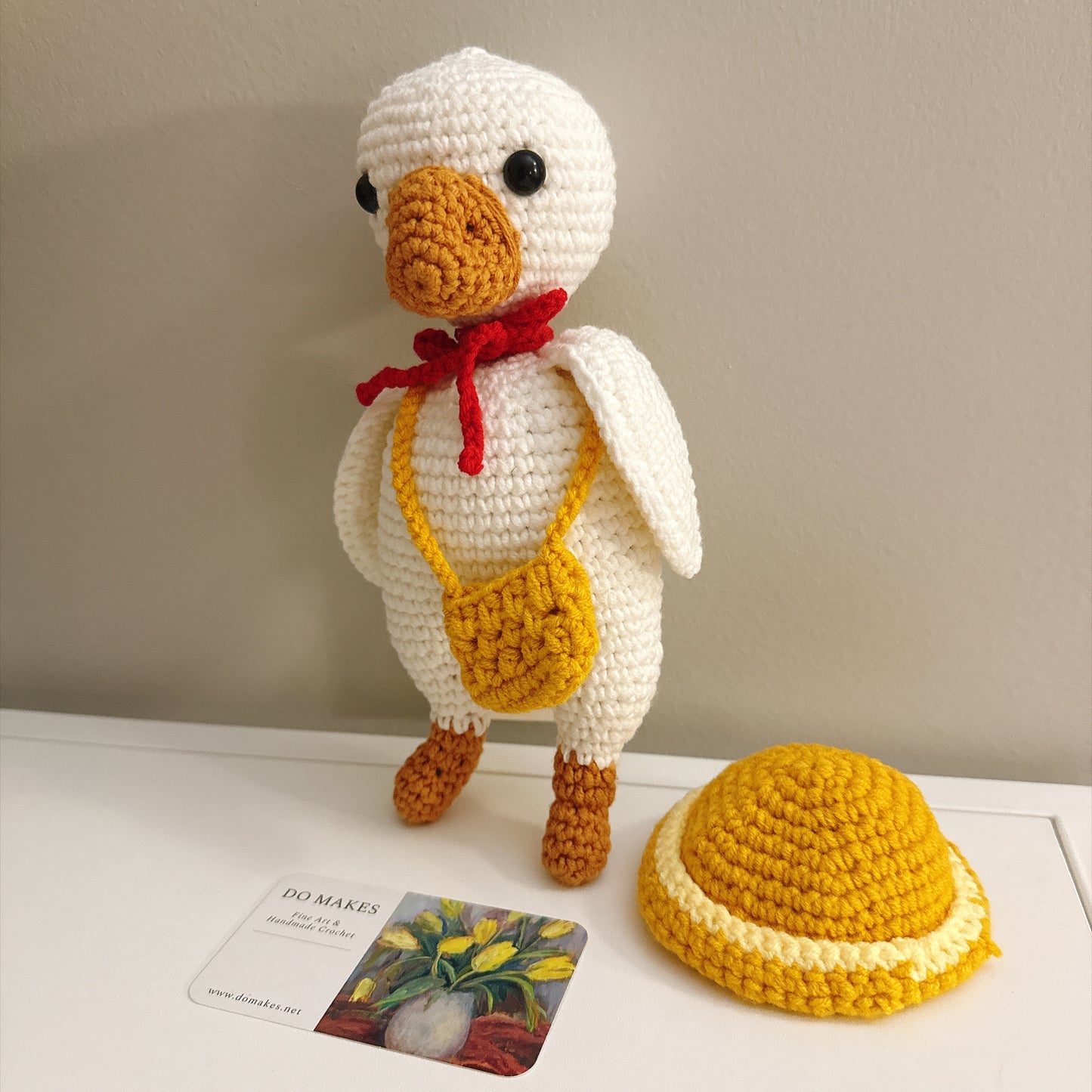 Crochet Goose with yellow hat