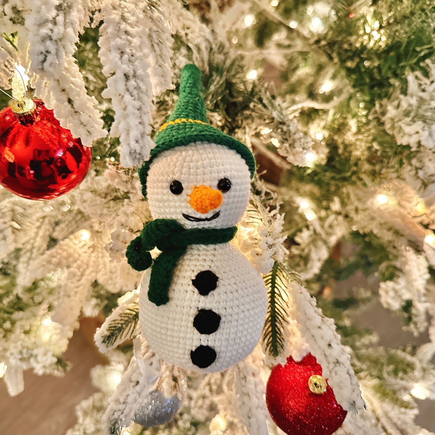 Snowman with green hat