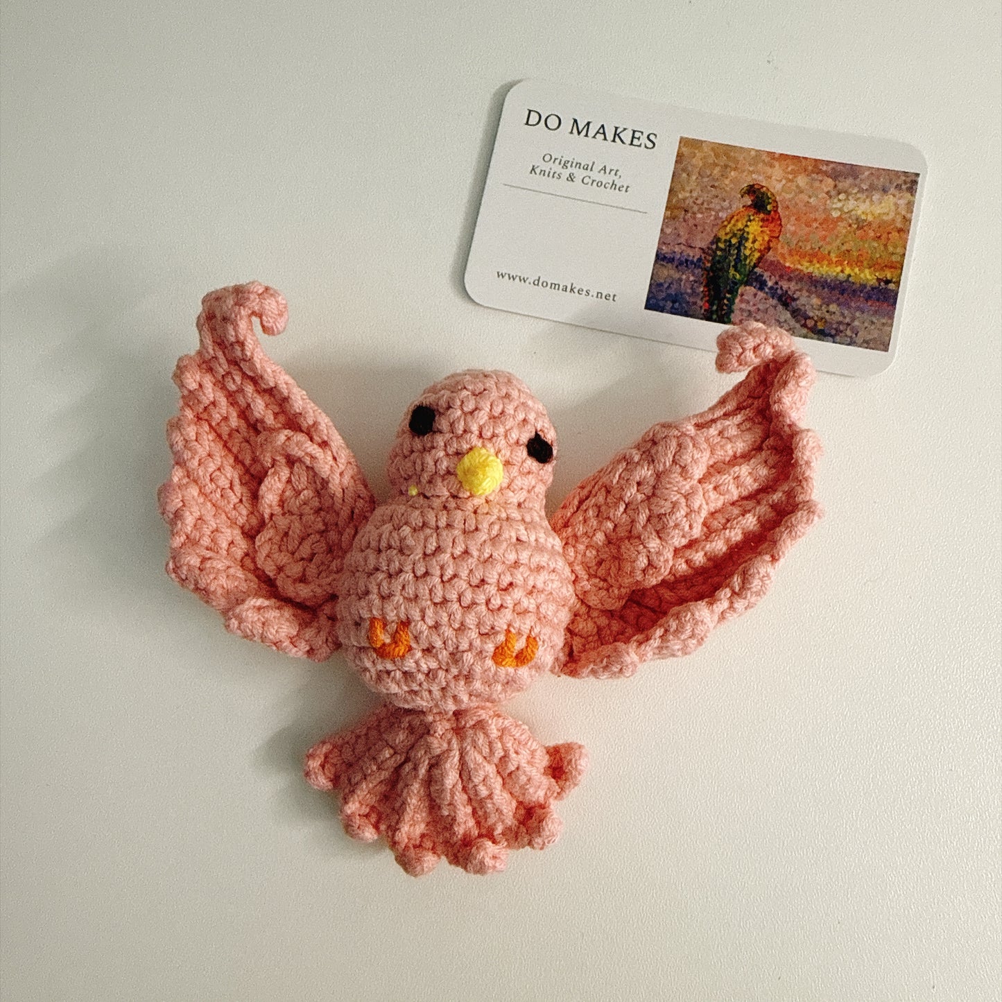 Pink Bird in Flight