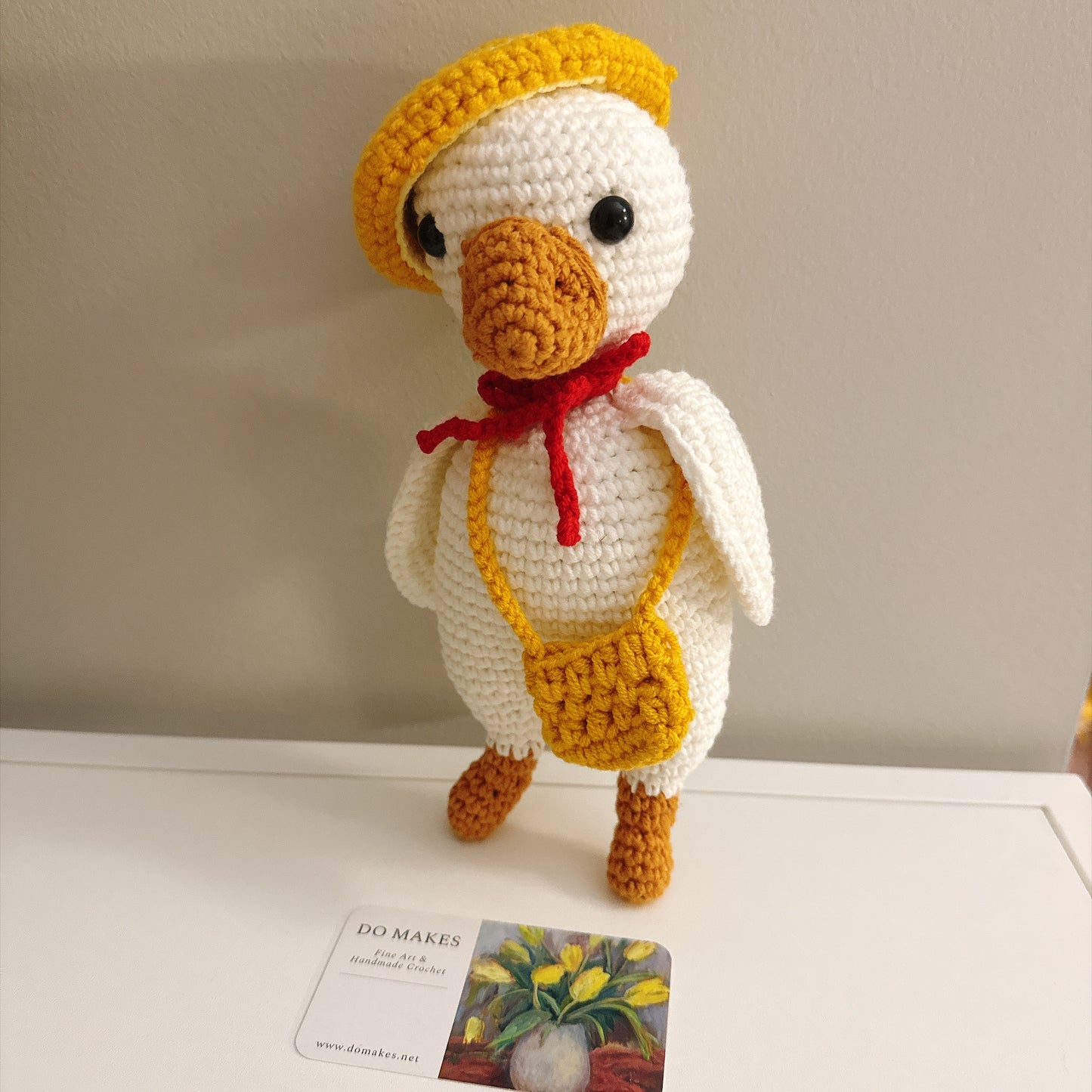 Crochet Goose with yellow hat