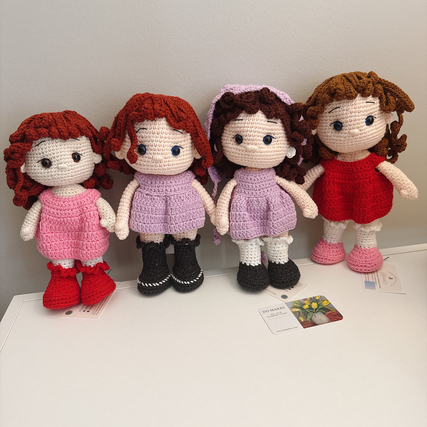 Red hair doll in pink dress & hat