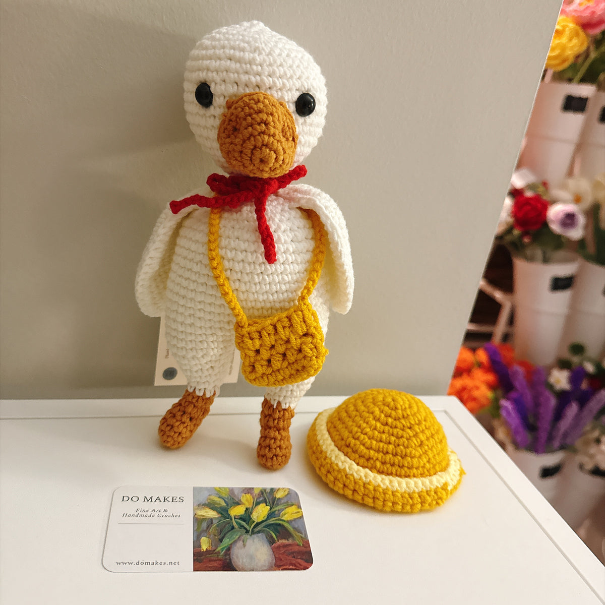 Crochet Goose with yellow hat